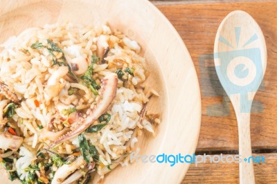 Rice Topped With Stir-fried Squid Basil (thai Food) Stock Photo