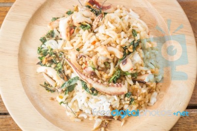 Rice Topped With Stir-fried Squid Basil (thai Food) Stock Photo