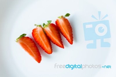 Ripe Red Strawberries On A Plate Stock Photo