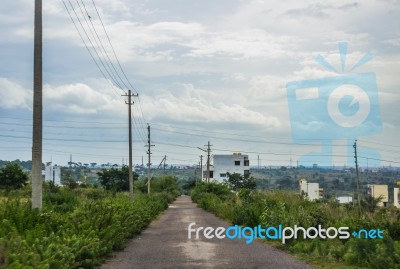 Road Leading To A City Stock Photo