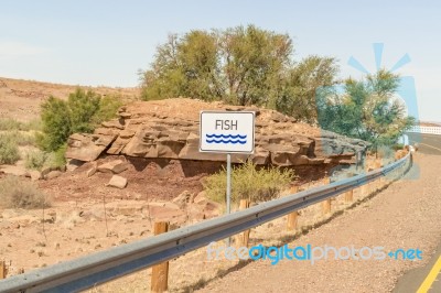 Road Sign For Fish River In Namibia Stock Photo