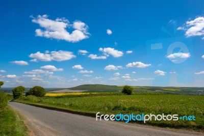 Road Through The Rolling Sussex Countryside Stock Photo