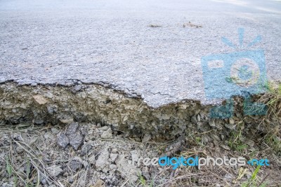 Roads Large Cracks From Shift Of Asphalt On Road Stock Photo