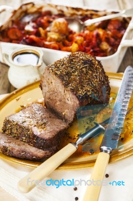 Roast Beef Joint With Roast Vegetables Stock Photo