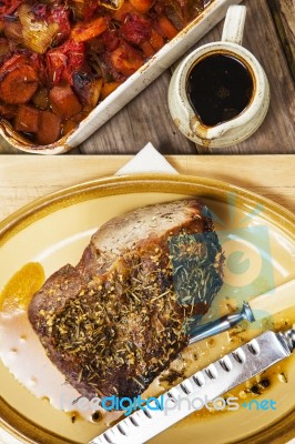 Roast Beef Joint With Roast Vegetables Stock Photo