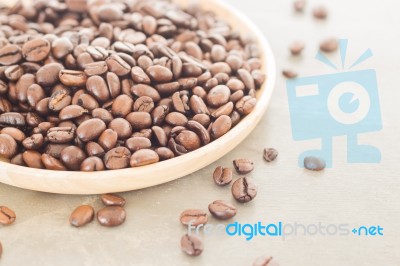 Roast Coffee Bean On Wooden Plate Stock Photo