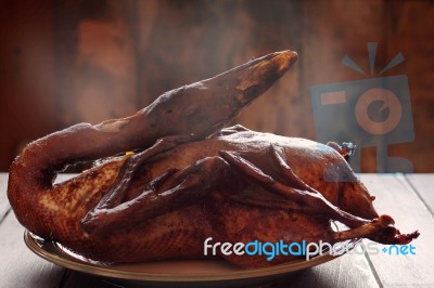 Roast Duck On Table Stock Photo