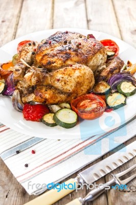 Roasted Chicken With Vegetables Stock Photo