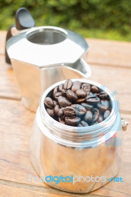 Roasted Coffee Beans In Moka Pot Stock Photo