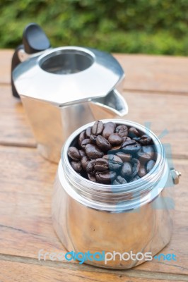 Roasted Coffee Beans In Moka Pot Stock Photo