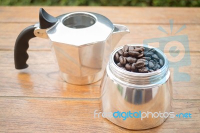 Roasted Coffee Beans In Moka Pot Stock Photo