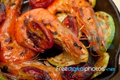 Roasted Shrimps With Zucchini And Tomatoes Stock Photo