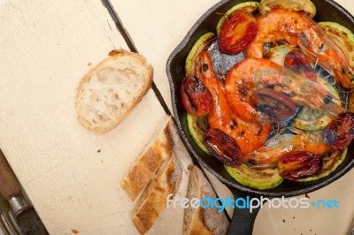 Roasted Shrimps With Zucchini And Tomatoes Stock Photo