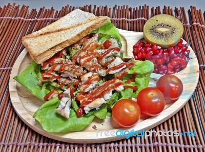 Roasting Chicken And Tomatoes Salad Stock Photo