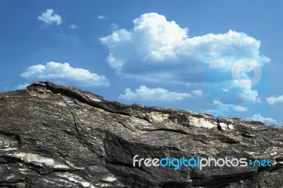 Rock And Blue Sky Stock Photo