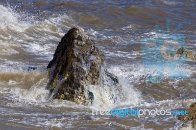 Rocks Pounded By The Sea At Hope Gap Stock Photo