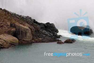 Rocks Under The Niagara Falls Stock Photo