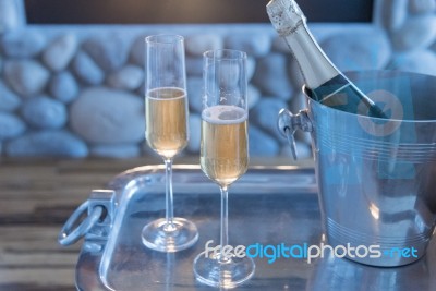 Romantic Champagne By The Fire Stock Photo