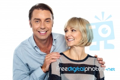 Romantic Lady Admiring Her Smart Looking Husband Stock Photo