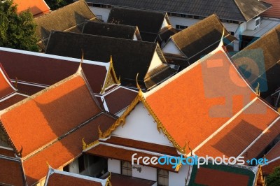 Roofs Of Temple And House Stock Photo