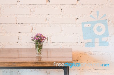 Room Interior White Brick Wall With Wooden Table Stock Photo