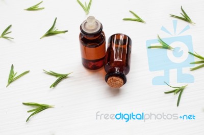 Rosemary Essential Oil On White Stock Photo