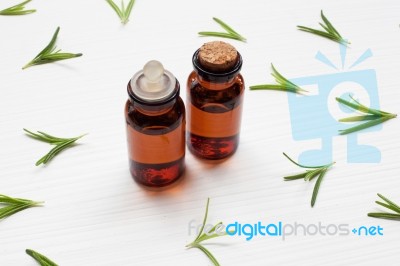 Rosemary Essential Oil On White Stock Photo