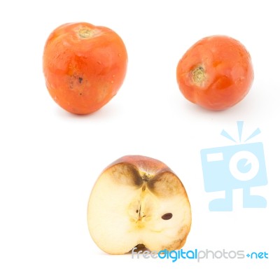 Rotten Apple  And Tomato Stock Photo