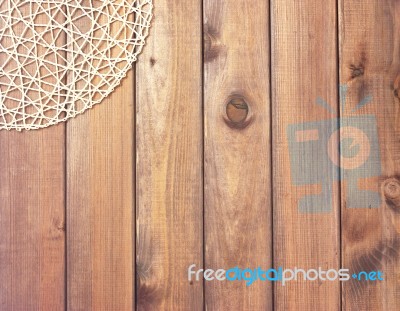 Round Rope Napkin Or Stand On A Wooden Rustic Table. To Create A… Stock Photo