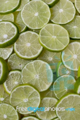 Round Slices Of Lime Fruit Stock Photo