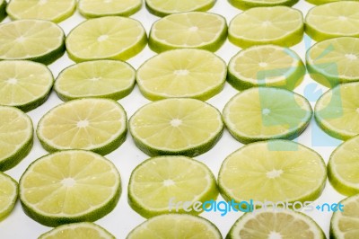 Round Slices Of Lime Fruit Stock Photo