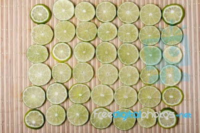 Round Slices Of Lime Fruit Stock Photo