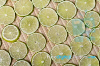 Round Slices Of Lime Fruit Stock Photo