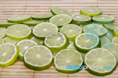 Round Slices Of Lime Fruit Stock Photo