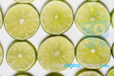 Round Slices Of Lime Fruit Stock Photo