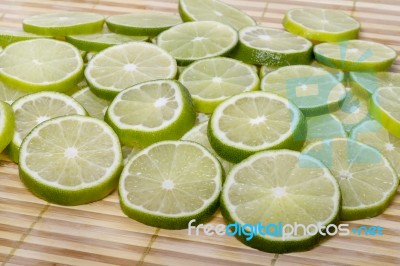 Round Slices Of Lime Fruit Stock Photo