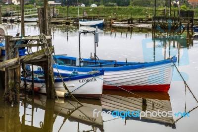 Row Of Fishing Boats In Southwold Harbour Stock Photo