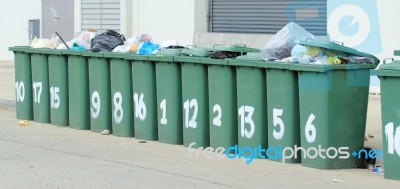 Row Of Large Green Bins Stock Photo