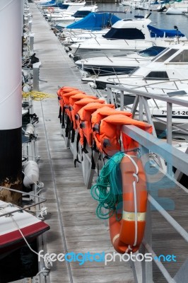 Row Of Lifejackets In Los Gigantes Marina Stock Photo