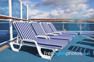 Row Of sunlounger Stock Photo