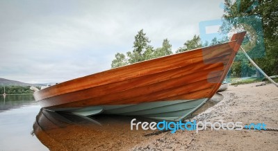 Rowing Boat Moored On Loch Insh Stock Photo