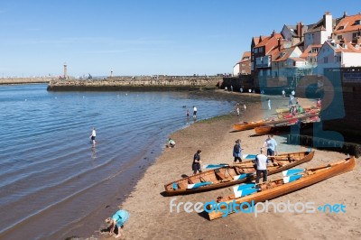 Rowing Boats Beached On The Sand At Whitby Stock Photo