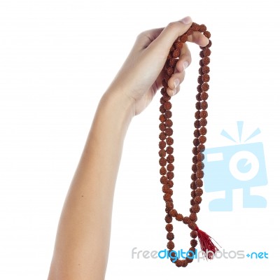 Rudraksha Rosary In A Female Hand. Japa Mala Stock Photo