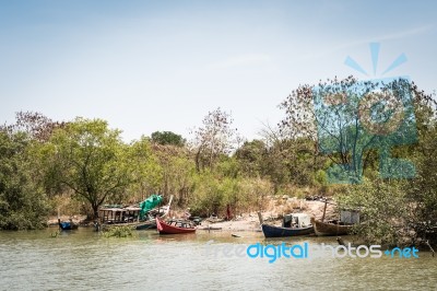 Ruin Of Wooden Boat In Canal Bank Stock Photo