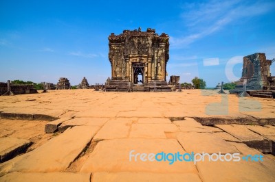 Ruins Of Phnom Bakheng Temple At Angkor Wat Complex Stock Photo