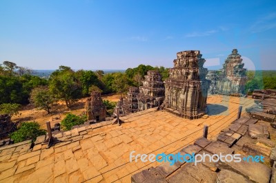 Ruins Of Phnom Bakheng Temple At Angkor Wat Complex Stock Photo