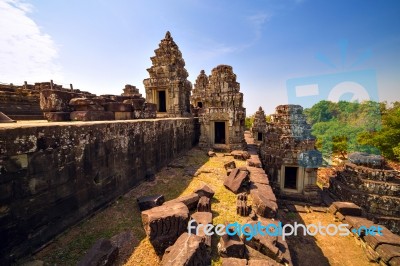 Ruins Of Phnom Bakheng Temple At Angkor Wat Complex Stock Photo