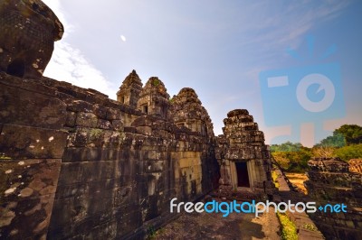 Ruins Of Phnom Bakheng Temple At Angkor Wat Complex Stock Photo