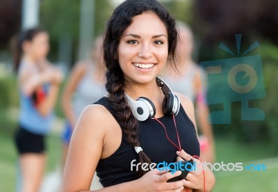 Running Girls Having Fun In The Park Stock Photo