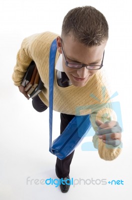 Running Student Holding Books Stock Photo